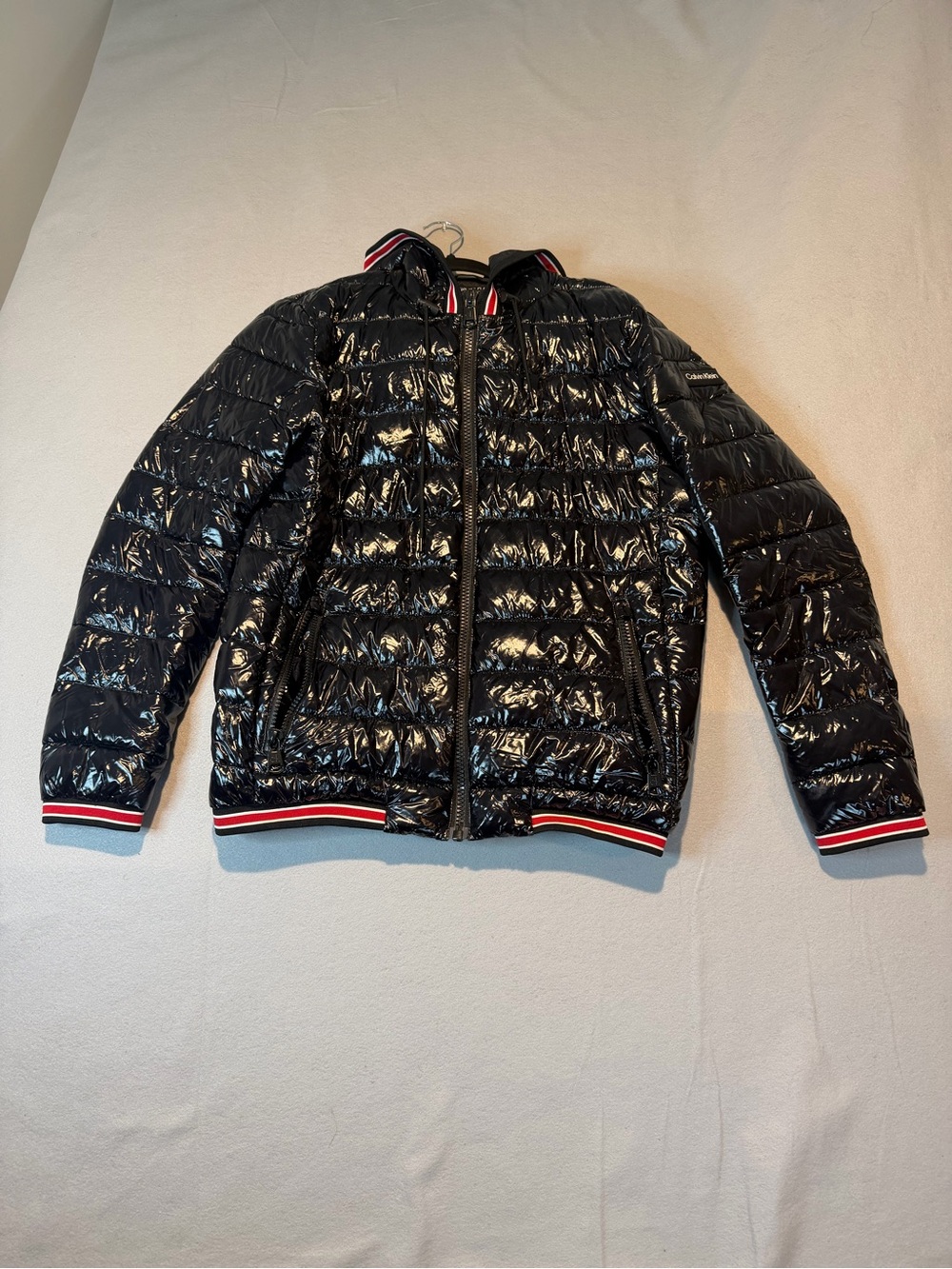 Calvin Klein Black Glossy Puffer Jacket with Red-White Trim